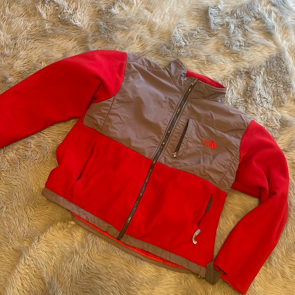 Condition 8/10. Sleeves were ruined in washer. Still warm and cozy.